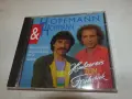 CD-Cover von Hoffmann & Hoffmann mit den beiden Künstlern und dem Titel "Himbeereis zum Frühstück".